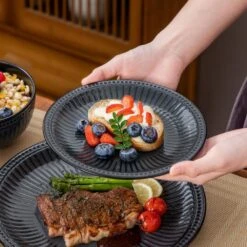 16-Piece Black Grey Porcelain Dinnerware Set Service For 4-Bowls And Plates Dinner Set Embossed Dots Pattern Tableware -Vancasso Shop black grey vancasso dinnerware sets eliga gy sl 1d 1000