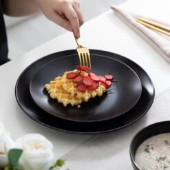 16-Piece Matte Black Stoneware Dinnerware Set Service For 4 Dishware Set With Plates Bowls And Mugs For Kitchen Dining -Vancasso Shop black vancasso dinnerware sets vc moda bk sl 31 1000