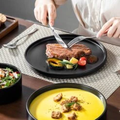 12-Piece Matte Black Stoneware Dinnerware Set Service For 4-Bowls And Plates Set Round Tableware Set 22 12-Piece Matte Black Stoneware Dinnerware Set Service For 4-Bowls And Plates Set Round Tableware Set -Vancasso Shop black vancasso dinnerware sets vc venus bk 12y 66 1000