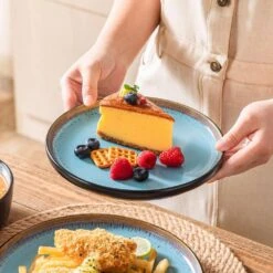 Series Amber 16-Piece Blue And Black Stoneware Dinnerware Set Service For 4 Bowls And Plates Dining Set Tableware -Vancasso Shop blue and black vancasso dinnerware sets vc amber b 16 1d 1000