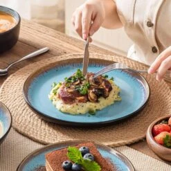 Series Amber 16-Piece Blue And Black Stoneware Dinnerware Set Service For 4 Bowls And Plates Dining Set Tableware -Vancasso Shop blue and black vancasso dinnerware sets vc amber b 16 66 1000