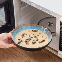 Series Amber 16-Piece Blue And Black Stoneware Dinnerware Set Service For 4 Bowls And Plates Dining Set Tableware -Vancasso Shop blue and black vancasso dinnerware sets vc amber b 16 fa 1000