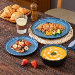 18-Piece Blue And Black Stoneware Dinnerware Set Service For 6 With Dinner Plates Dessert Plates And Cereal Bowls -Vancasso Shop blue and black vancasso dinnerware sets vc pla b 18 eu 31 1000