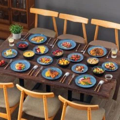 18-Piece Blue And Black Stoneware Dinnerware Set Service For 6 With Dinner Plates Dessert Plates And Cereal Bowls -Vancasso Shop blue and black vancasso dinnerware sets vc pla b 18 eu 44 1000