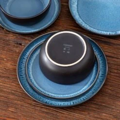 18-Piece Blue And Black Stoneware Dinnerware Set Service For 6 With Dinner Plates Dessert Plates And Cereal Bowls -Vancasso Shop blue and black vancasso dinnerware sets vc pla b 18 eu 77 1000