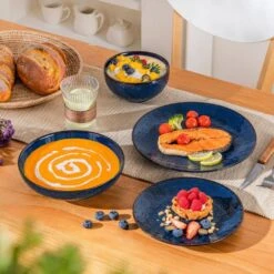 16-Piece Blue Stoneware Dinnerware Set Service For 4-Embossed Star-shape Floral Pattern Bowls And Plates Set 22 16-Piece Blue Stoneware Dinnerware Set Service For 4-Embossed Star-shape Floral Pattern Bowls And Plates Set -Vancasso Shop blue vancasso dinnerware sets lydia sl b 01 fa 1000