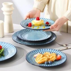 16-Piece Blue Porcelain Dinnerware Set Service For 4-Embossed Pattern Tableware With Dinner Plate Dessert Plate Bowl Mug 27 16-Piece Blue Porcelain Dinnerware Set Service For 4-Embossed Pattern Tableware With Dinner Plate Dessert Plate Bowl Mug -Vancasso Shop blue vancasso dinnerware sets nile b sl 31 1000