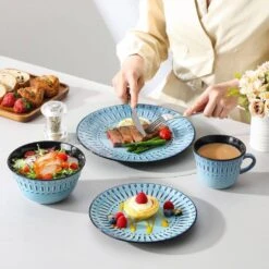 16-Piece Blue Porcelain Dinnerware Set Service For 4-Embossed Pattern Tableware With Dinner Plate Dessert Plate Bowl Mug 24 16-Piece Blue Porcelain Dinnerware Set Service For 4-Embossed Pattern Tableware With Dinner Plate Dessert Plate Bowl Mug -Vancasso Shop blue vancasso dinnerware sets nile b sl fa 1000