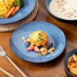 16-Piece Blue Stoneware Dinnerware Set (Service Set For 4) Bowls And Plates Dinner Set 19 16-Piece Blue Stoneware Dinnerware Set (Service Set For 4) Bowls And Plates Dinner Set -Vancasso Shop blue vancasso dinnerware sets vc bubble b 16t 1d 1000