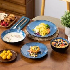 16-Piece Blue Stoneware Dinnerware Set (Service Set For 4) Bowls And Plates Dinner Set 27 16-Piece Blue Stoneware Dinnerware Set (Service Set For 4) Bowls And Plates Dinner Set -Vancasso Shop blue vancasso dinnerware sets vc bubble b 16t 76 1000