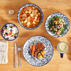 16-Piece Blue Porcelain Dinnerware Set Service For 4 Dinner Set With Dinner Plates Dessert Plates Cereal Bowls And Mugs 21 16-Piece Blue Porcelain Dinnerware Set Service For 4 Dinner Set With Dinner Plates Dessert Plates Cereal Bowls And Mugs -Vancasso Shop blue vancasso dinnerware sets vc selene 16b a0 1000