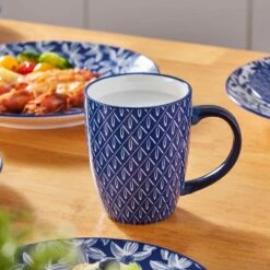 16-Piece Blue Porcelain Dinnerware Set Service For 4 Dinner Set With Dinner Plates Dessert Plates Cereal Bowls And Mugs 31 16-Piece Blue Porcelain Dinnerware Set Service For 4 Dinner Set With Dinner Plates Dessert Plates Cereal Bowls And Mugs -Vancasso Shop blue vancasso dinnerware sets vc selene 16b d4 1000