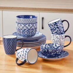 16-Piece Blue Porcelain Dinnerware Set Service For 4 Dinner Set With Dinner Plates Dessert Plates Cereal Bowls And Mugs 33 16-Piece Blue Porcelain Dinnerware Set Service For 4 Dinner Set With Dinner Plates Dessert Plates Cereal Bowls And Mugs -Vancasso Shop blue vancasso dinnerware sets vc selene 16b fa 1000 1