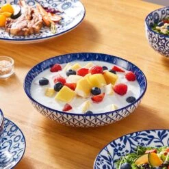 16-Piece Blue Porcelain Dinnerware Set Service For 4 Tableware With Dinner Plates Salad Plates Pasta Bowls Cereal Bowls 19 16-Piece Blue Porcelain Dinnerware Set Service For 4 Tableware With Dinner Plates Salad Plates Pasta Bowls Cereal Bowls -Vancasso Shop blue vancasso dinnerware sets vc selene sl fa 1000