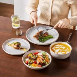 16-Piece Cream White And Beige Stoneware Dinnerware Set Service For 4-Bowls And Plates Set Tableware Dinner Set -Vancasso Shop cream white and beige vancasso dinnerware sets vc snow bg 16 eu 31 1000