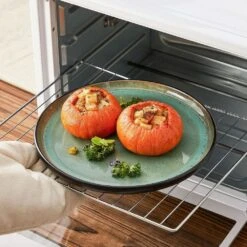 Series Amber 16-Piece Green And Black Stoneware Dinnerware Set Service For 4 Bowls And Plates Dining Set Tableware -Vancasso Shop green and black vancasso dinnerware sets vc amber g 16 fa 1000