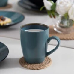 16-Piece Green Stoneware Dinnerware Set Service For 4 Tableware Set With Plates Bowls And Mugs 21 16-Piece Green Stoneware Dinnerware Set Service For 4 Tableware Set With Plates Bowls And Mugs -Vancasso Shop green vancasso dinnerware sets vc bubble g sl fa 1000