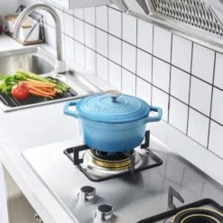 5 Qt. Non-Stick Cast Iron Round Dutch Oven In Light Blue With Lid -Vancasso Shop light blue vancasso dutch ovens vs ztr 26 lb 44 1000