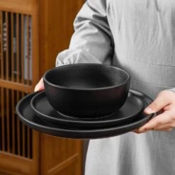 18-Piece Matte Black Stoneware Dinnerware Set Service For 6 Tableware Dinner Plates Dessert Plates Cereal Bowls 29 18-Piece Matte Black Stoneware Dinnerware Set Service For 6 Tableware Dinner Plates Dessert Plates Cereal Bowls -Vancasso Shop matte black vancasso dinnerware sets vc pla bk 18 eu 76 1000