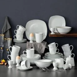 50-Piece Neutral White Porcelain Dinnerware Set -Vancasso Shop off white vancasso dinnerware sets elisa 50 31 1000