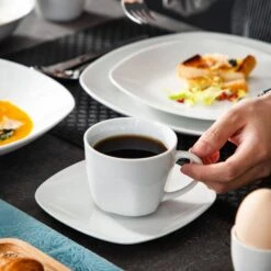 50-Piece Neutral White Porcelain Dinnerware Set -Vancasso Shop off white vancasso dinnerware sets elisa 50 44 1000