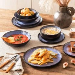 Series Amber 16-Piece Purple And Black Stoneware Dinnerware Set Service For 4 Bowls And Plates Dining Set Tableware -Vancasso Shop purple and black vancasso dinnerware sets vc amber v 16 31 1000