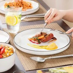 18-Piece White Black Rim Porcelain Dinnerware Set Service For 6 Tableware With Dinner Plates Dessert Plates And Bowls 24 18-Piece White Black Rim Porcelain Dinnerware Set Service For 6 Tableware With Dinner Plates Dessert Plates And Bowls -Vancasso Shop white black rim vancasso dinnerware sets leah 18 bt d4 1000