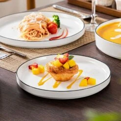 24-Piece White Color Black Rim Porcelain Dinnerware Set Service For 6 Tableware Bowls And Plates Dinner Set 22 24-Piece White Color Black Rim Porcelain Dinnerware Set Service For 6 Tableware Bowls And Plates Dinner Set -Vancasso Shop white black rim vancasso dinnerware sets leah 24 bt fa 1000