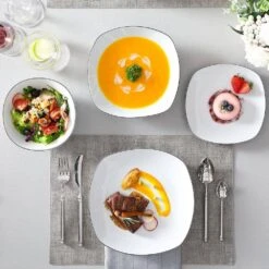 24-Piece Gray-White Porcelain Dinnerware Set Service For 6 Dining Set Black Rim Dishware Bowls And Plates Set 22 24-Piece Gray-White Porcelain Dinnerware Set Service For 6 Dining Set Black Rim Dishware Bowls And Plates Set -Vancasso Shop white with balck rim vancasso dinnerware sets elisa 24 bt d4 1000