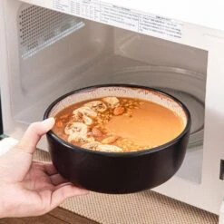 Series Amber 12-Piece Yellow And Black Stoneware Dinnerware Set Service For 4 Bowls And Plates Dining Set Tableware -Vancasso Shop yellow and black vancasso dinnerware sets vc amber y 12 40 1000