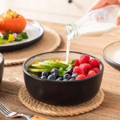 Series Amber 12-Piece Yellow And Black Stoneware Dinnerware Set Service For 4 Bowls And Plates Dining Set Tableware -Vancasso Shop yellow and black vancasso dinnerware sets vc amber y 12 77 1000